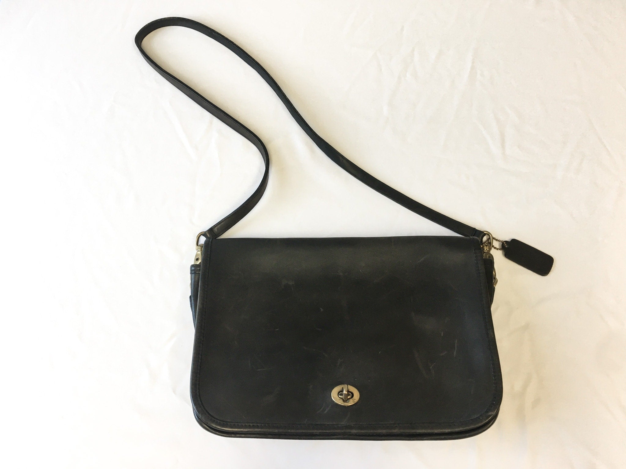 Exploring the Timeless Charm of Vintage Black Leather Coach Purses