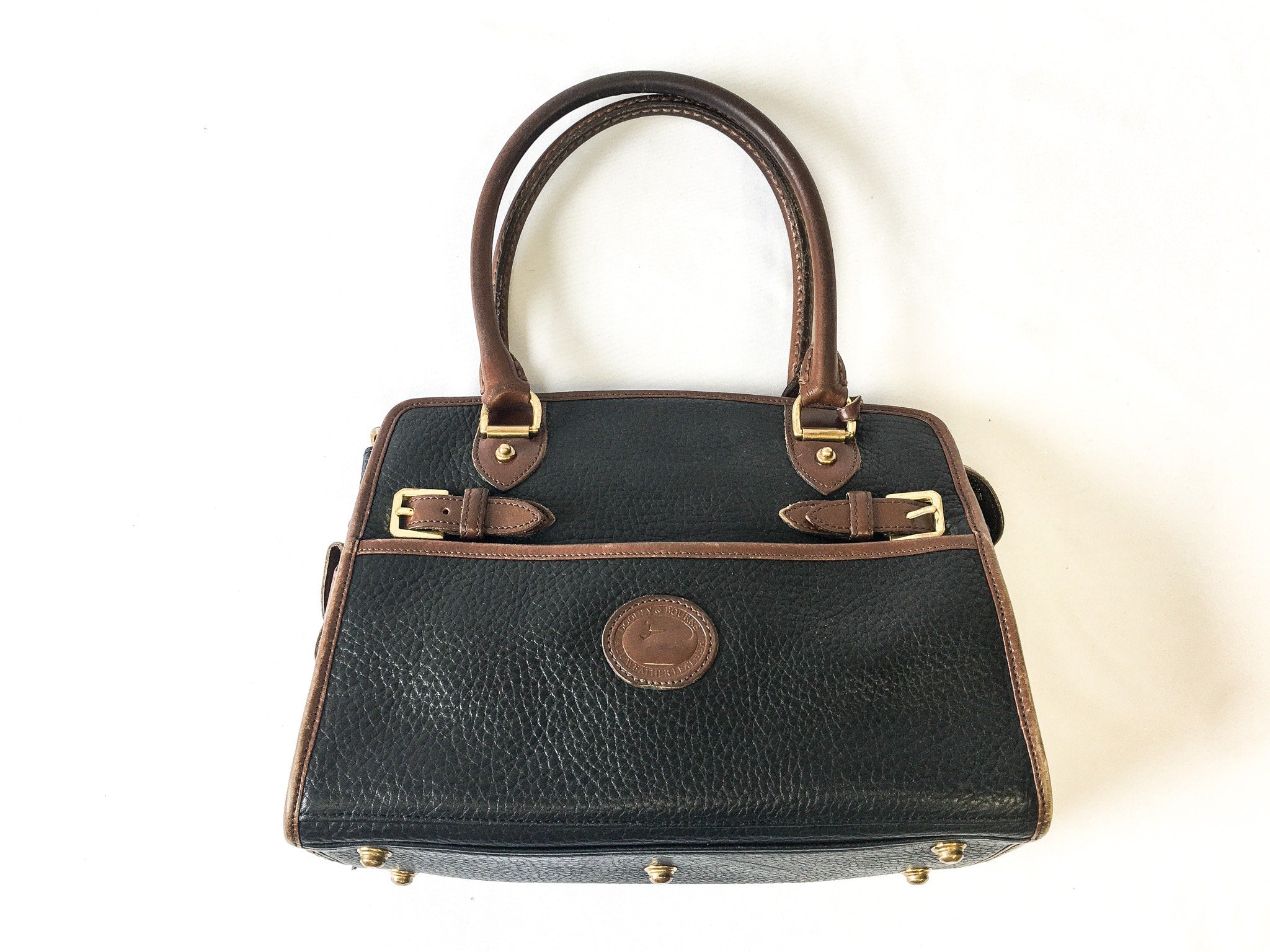 Dooney and bourke black and brown leather purse best sale