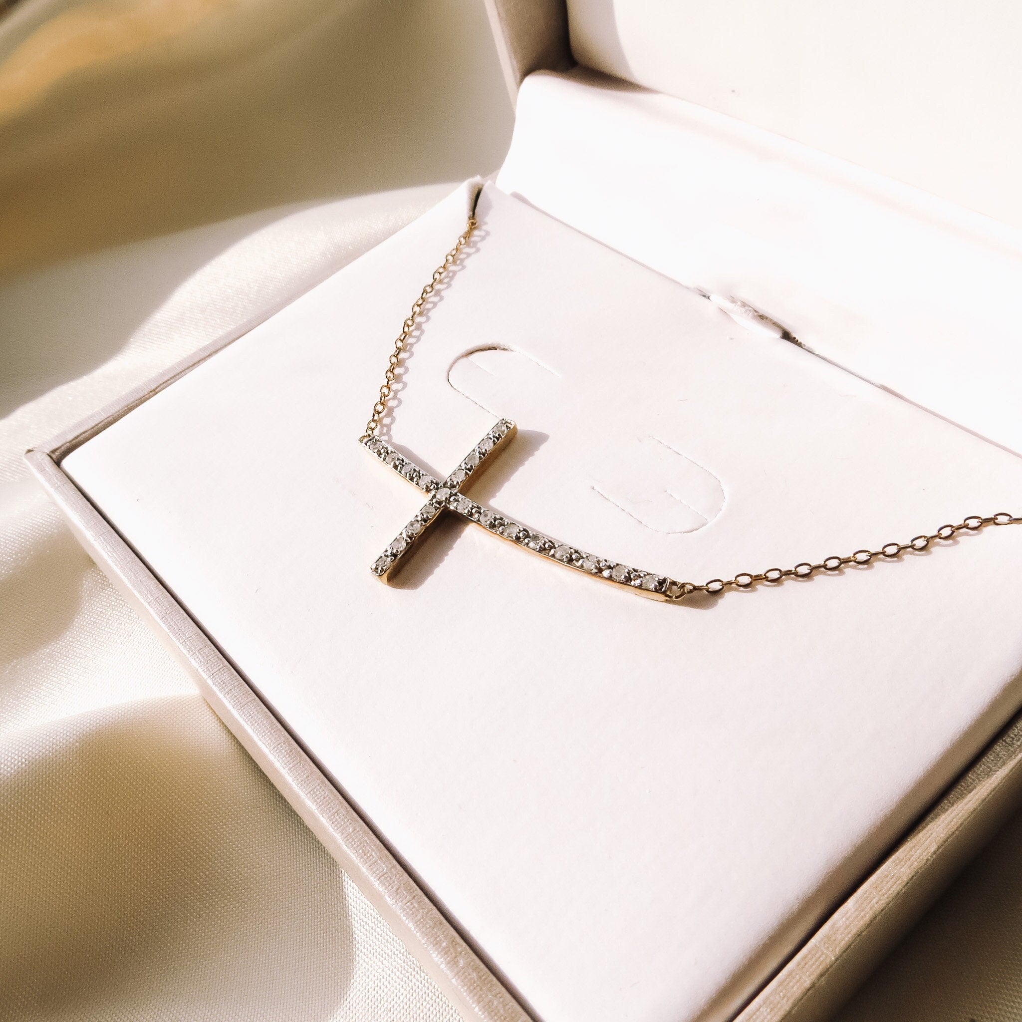 Horizontal diamond cross on sale necklace